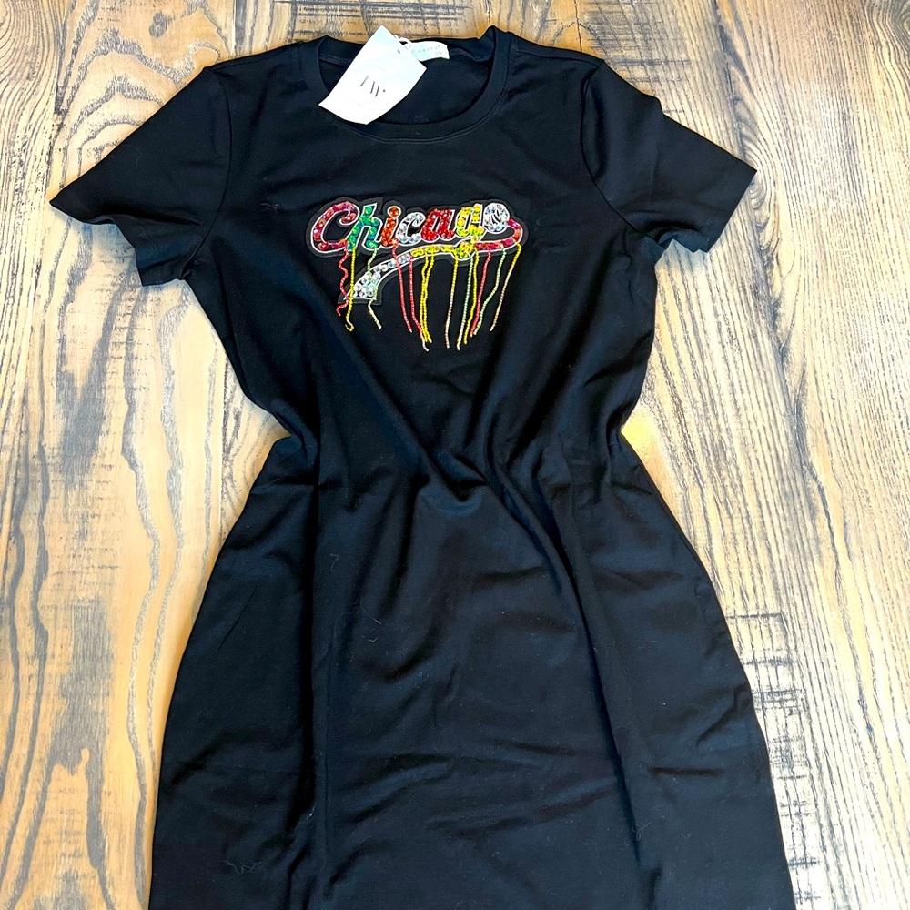 Black dress with “Chicago” embellishments NWT